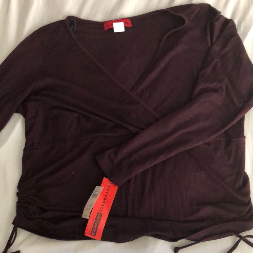 Necessary Objects runs small, more of a wine color